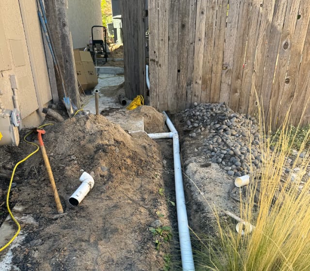 Drainaige ditch with newly installed pipes